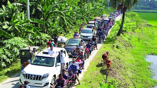An election rally of Khalilur Rahman, chairman candidate of Bhabanipur union of Barura upazila, Comilla greeted by the locals of the area. This photo was taken on Thursday.