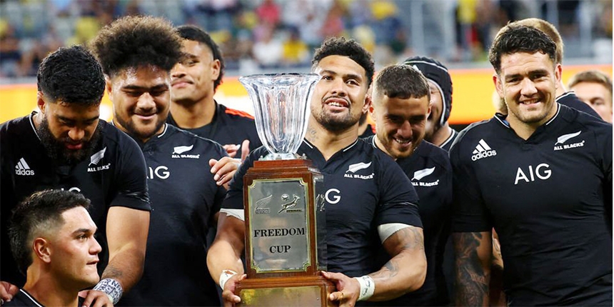 New Zealand's captain Ardie Savea celebrates winning Freedom Cup with teammates after the rugby Championship match against South Africa in Townsville on Saturday.
