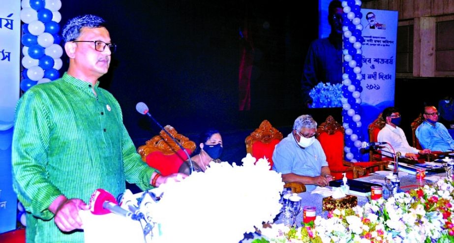 State Minister for Shipping Khalid Mahmud Chowdhury speaks at a meeting as the chief guest organised by National River Conservation Commission at National Sports Council auditorium in the capital on Sunday marking World Rivers Day. NN photo