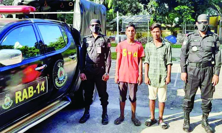 Members of RAB-14 arrest two muggers named Mohan (21) and Hasan (20) with switch gear knives from Bhairab's Syed Nazrul Bridge on Saturday night.
