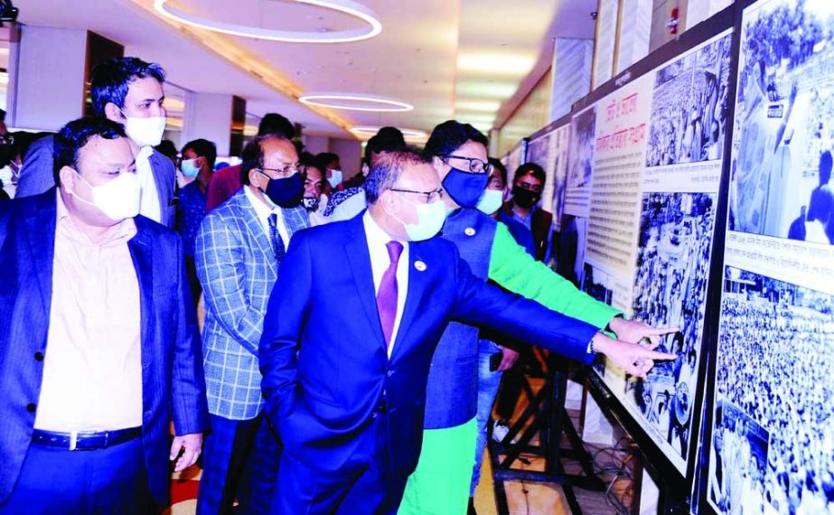LGRD and Cooperatives Minister Tajul Islam inspects news photo exhibition titled 'Extraordinary Sheikh Hasina' organised by Canadian University of Bangladesh at Sheraton Hotel in the city on Monday. NN photo
