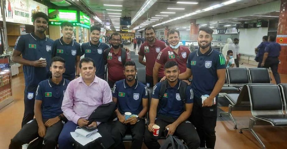 Members of Bangladesh Football team pose for a photo session at the Hazrat Shahjalal International Airport on Tuesday before leaving for Maldives. NN photo