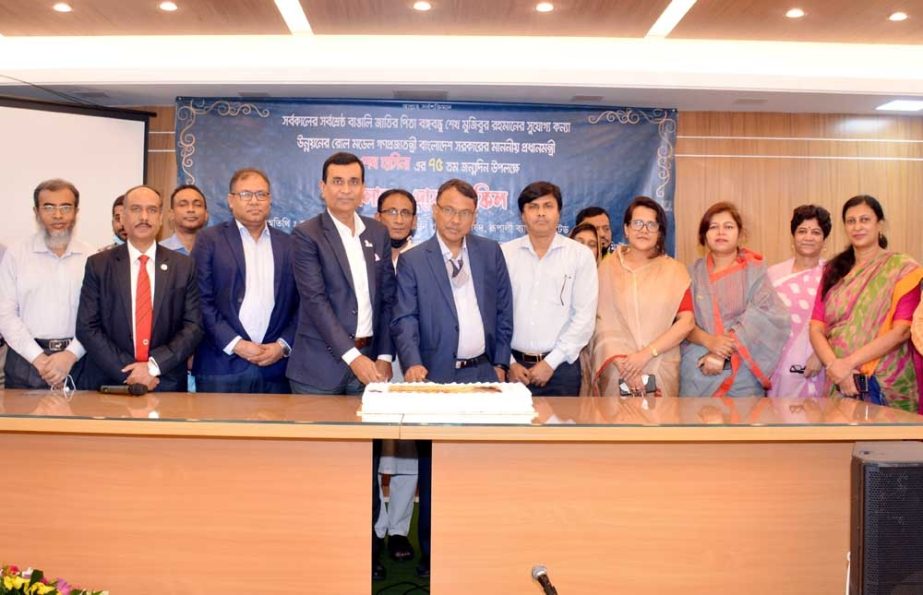 Kazi Sanaul Hoq, Chairman along with Md. Obayed Ullah Al Masud, Managing director & CEO of Rupali Bank Limited, celebrating the 75th birth anniversary of Prime Minister Sheikh Hasina through cutting a cake at the bank's head office in the capital on Tues