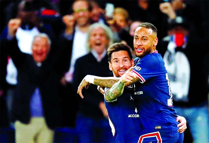 Paris St Germain's Lionel Messi (left) celebrates scoring their second goal with Neymar during the match against Manchester City in Paris, France on Tuesday.