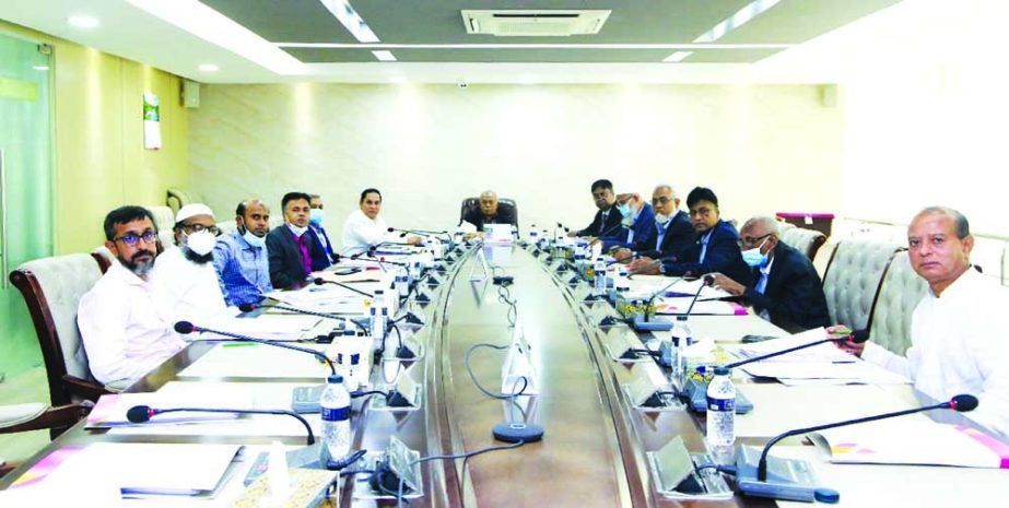 Abdul Kadir Molla, Chairman of South Bangla Agriculture & Commerce (SBAC) Bank Limited, presiding over the 127th Board of Directors Meeting at the bank's head office in the capital on Thursday. Mizanur Rahman, AZM Shofiuddin (Shamim), Captain M. Moazzam