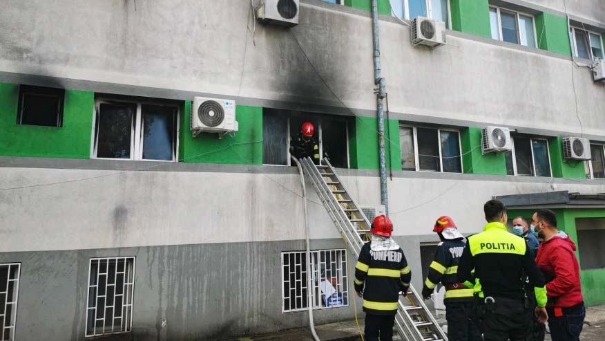 In this image released by Romania’s Emergency Situations Inspectorate, firefighters put out a blaze at the COVID-19 ICU section of the Hospital for Infectious Diseases in the Black Sea port of Constanta, Romania, Friday, Oct. 1, 2021. Authorities say a