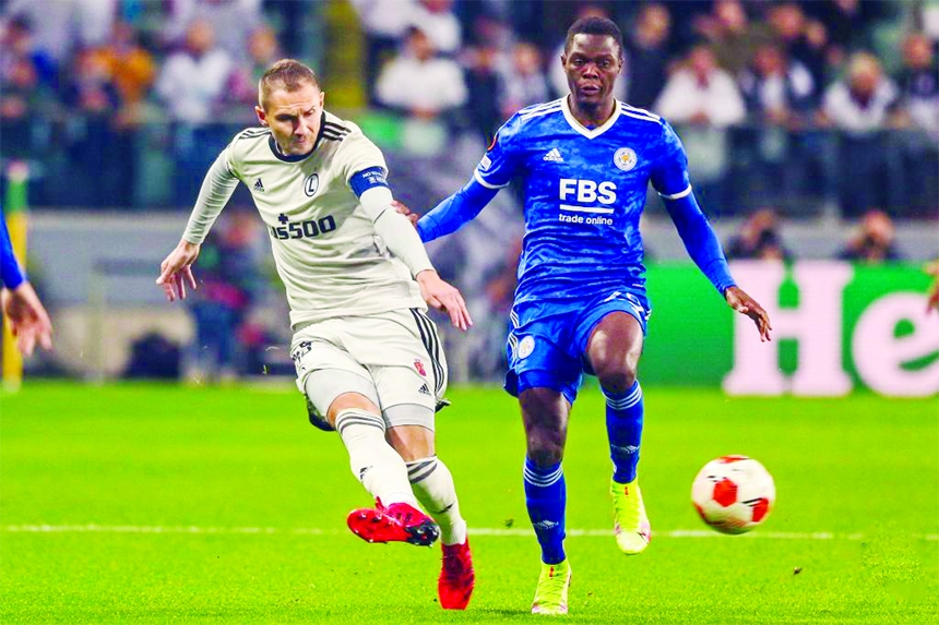 Artur Jedrzejczyk (left) of Legia vies with Patson Daka of Leicester during the Europa League Group C football match between Legia Warsaw and Leicester City in Warsaw, Poland on Thursday.