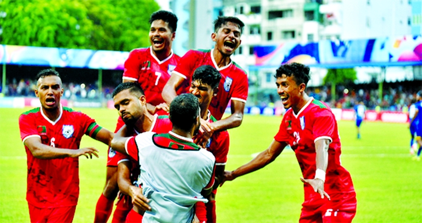 Players of Bangladesh Football team celebrating after scoring a goal against Sri Lanka in their first match of the SAFF Championship at the Male National Football Stadium the capital city of Maldives on Friday.