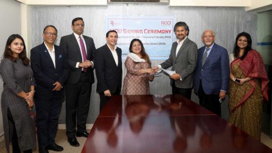 Rupali Haque Chowdhury, President of Foreign Investors Chamber of Commerce & Industry (FICCI) and Managing Director of Berger (BD) and Murteza Rafi Khan, CEO of Bangladesh Business and Disability Network (BBDN), exchanging document after signing a MoU in