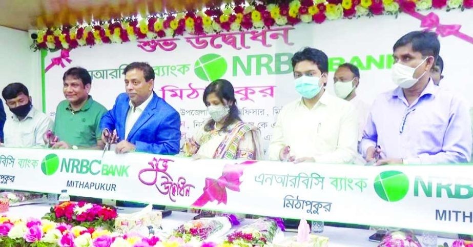 SM Parvez Tamal, Chairman of NRBC Bank Limited, inaugurating the bank's new sub-branch at Mithapukur in Rangpur recently. Rasel Ahmed Liton, Chief Executive of SKS Foundation, Abdus Salam Pramanik, District Register, Mahmud Hasan Mridha and other local e