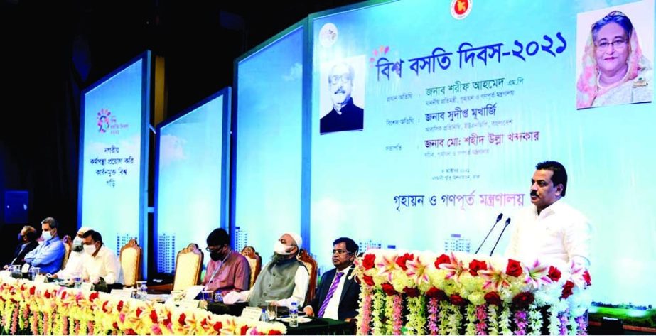 State Minister for Housing and Public Works Sharif Ahmed speaks at a discussion in Osmani Memorial auditorium in the city on Monday marking World Habitat Day. NN photo