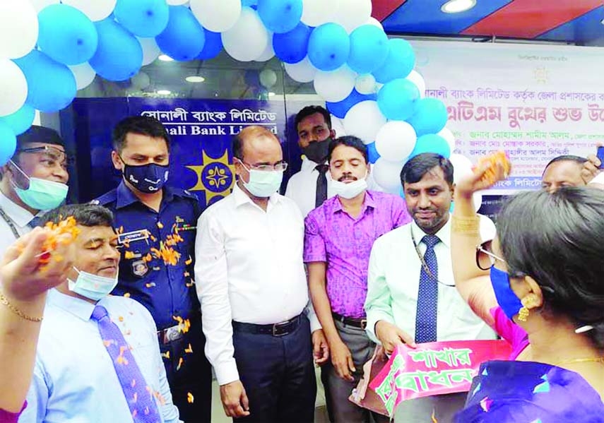 Kishoreganj Deputy Commissioner Mohammad Shamim Alam inaugurates Sonali Bank ATM booth at Collectorate premises on Sunday while DGM Jahangir Alam Siddique presided over. Additional SP (Administration) Mustaque Sarker and others dignified persons were al