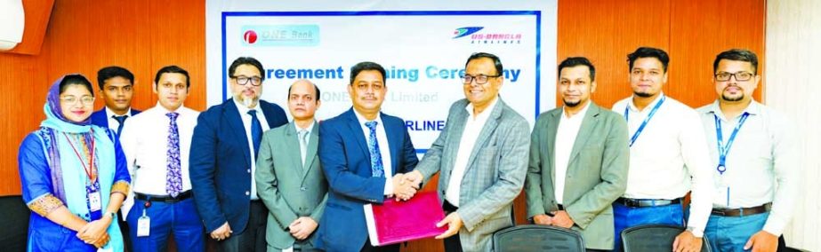 Md Shafiqul Islam, Head of Marketing and Sales of US-Bangla Airlines Limited and Md Kamruzzaman, Head of Retail Banking of ONE Bank Limited (OBL), exchanging documents after signing an agreement at the bank's head office in the city recently. As per the