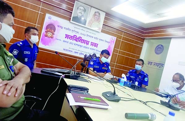 Police Super (SP) of Kishoreganj Mashrukur Rahman Khaled Bpm (Bar) speaks at a view exchange special meeting ahead of the Durga Puja in Police Office conference room on Thursday.