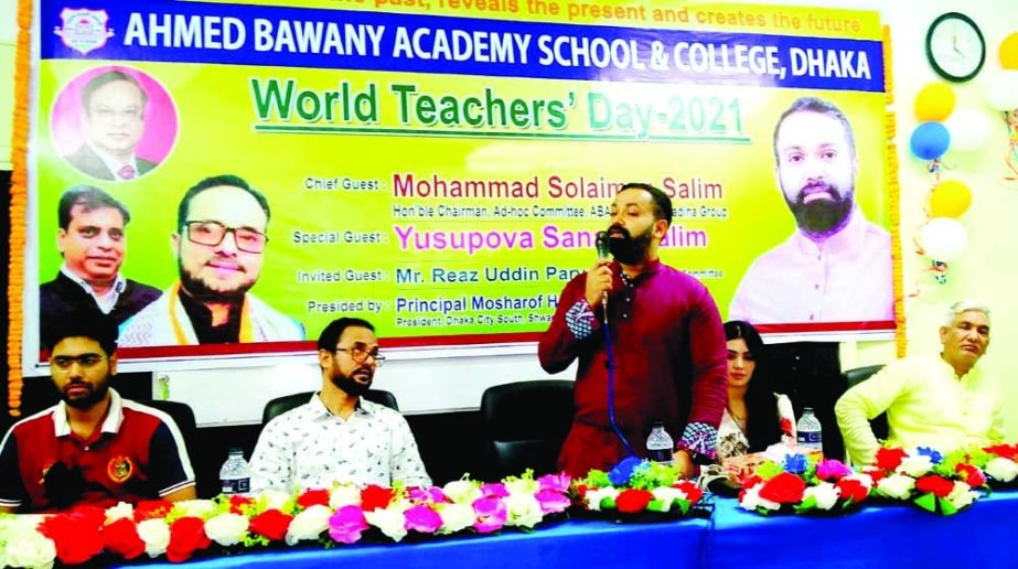 Chairman of the governing body of the city's Ahmed Bawani Academy School and College Solaiman Salim speaks at a discussion marking World Teachers Day in the auditorium of the institution on Thursday. Principal of the institution Mosharof Hosain Munshi, a