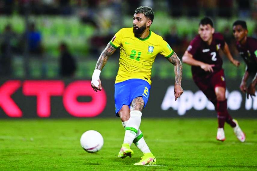 Brazil's Gabriel Barbosa takes a penalty against Venezuela during a South American World Cup qualifying match in Caracas, Venezuela on Thursday.
