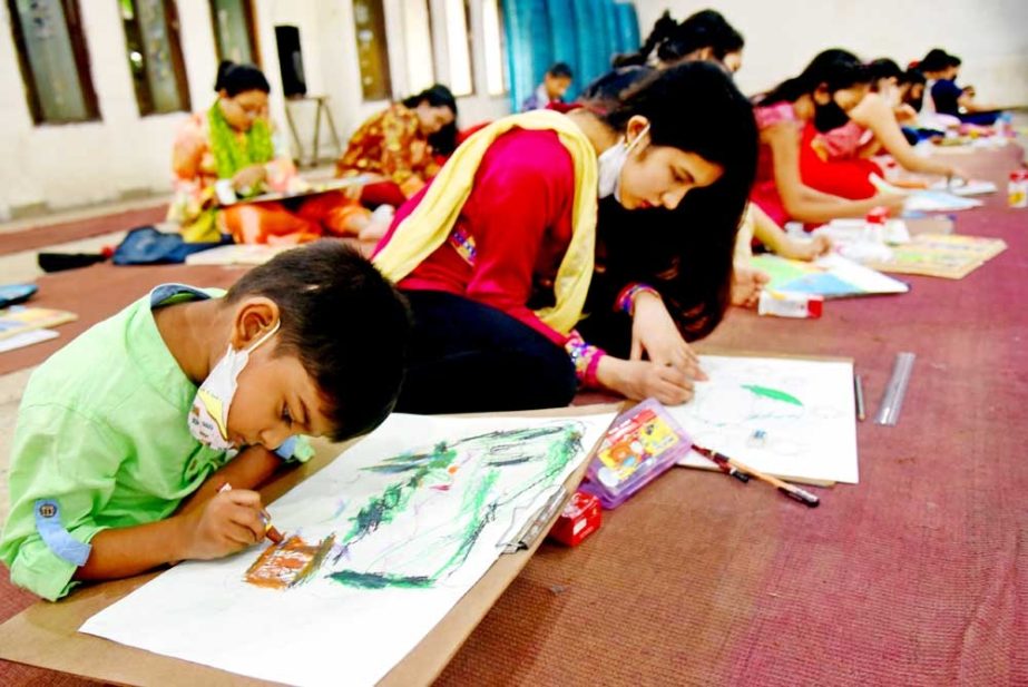 Children participate in the drawing competition marking the founding anniversary of the Jatiya Press Club in its auditorium on Saturday. NN photo