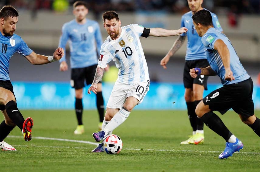 Argentina's Lionel Messi (center) in action during their World Cup qualifier at home against Uruguay on Sunday.