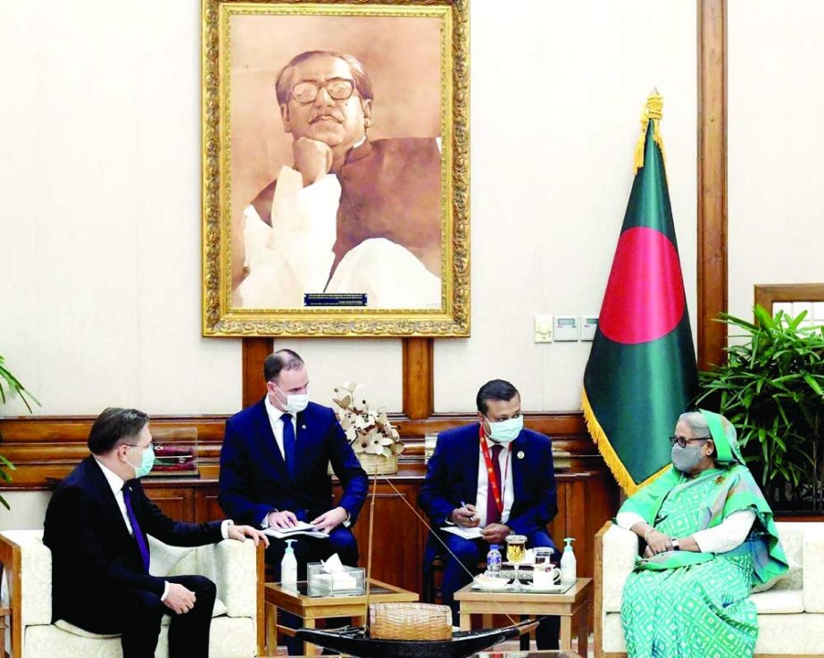 Director General of Rosatom State Atomic Energy Corporation of Russia Alexey Likhachev meets Prime Minister Sheikh Hasina at Ganobhaban on Monday. PID photo