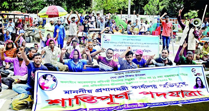 Teachers of schools for the disabled stage a peaceful rally at Shahbagh area in the capital on Tuesday to press their 11-point demand.