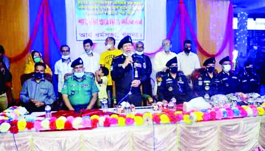Rab DG Chowdhury Abdullah Al Mamun addresses a meeting as chief guest held at Khulna Arya Dharma Shava temple in Khulna city on the occasion of Durga Puja on Tuesday.