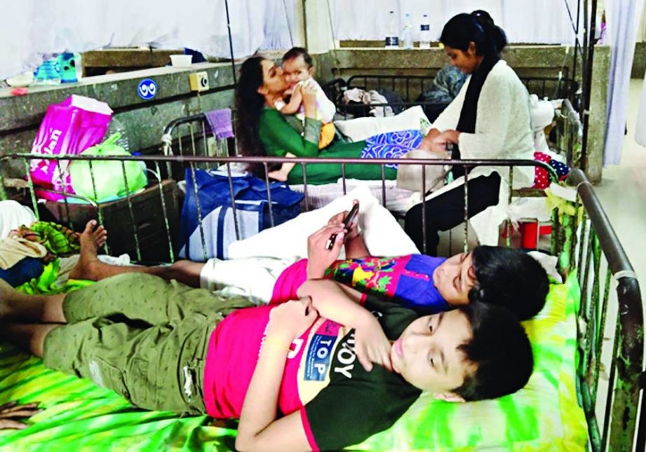 Two dengue infected children seen in beds at Dhaka’s Shishu Hospital on Wednesday as the number patients is increasing in the city. NN photo