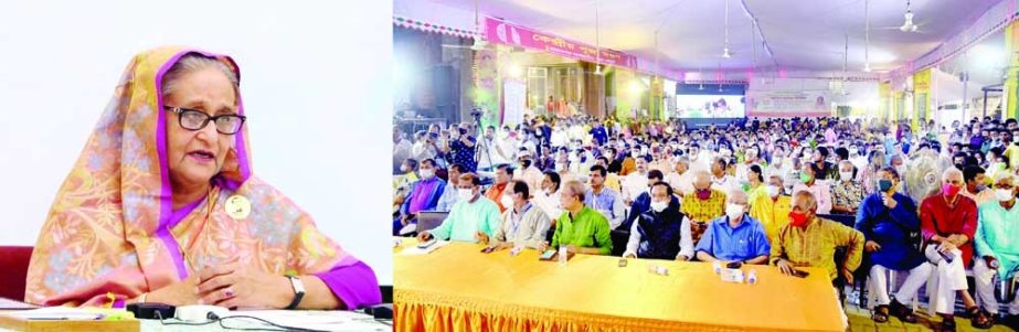 Prime Minister Sheikh Hasina exchanges greetings with people of the Hindu community at Dhakeshwari Mandir Puja Mondop from Ganabhaban through a videoconference on Thursday on the occasion of Durga Puja. PID photo