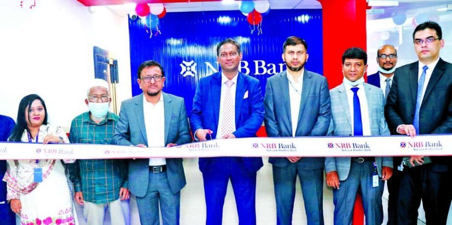 Mohammad Jamil Iqbal, Vice Chairman of NRB Bank Limited, inaugurating the bank's sub-branches at Topkhana Road in the capital recently. Mamoon Mahmood Shah, Managing Director & CEO and other officer of the bank were present.