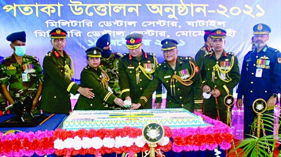 General Officer Commanding (GOC) 19 Infantry Division and Area Commander, Ghatail area Major General Syed Tareq Hussain cuts a cake formally at the flag hoisting ceremony of Military Dental Centre Ghatail and Military Dental Centre Momenshahi at Shahid Sa