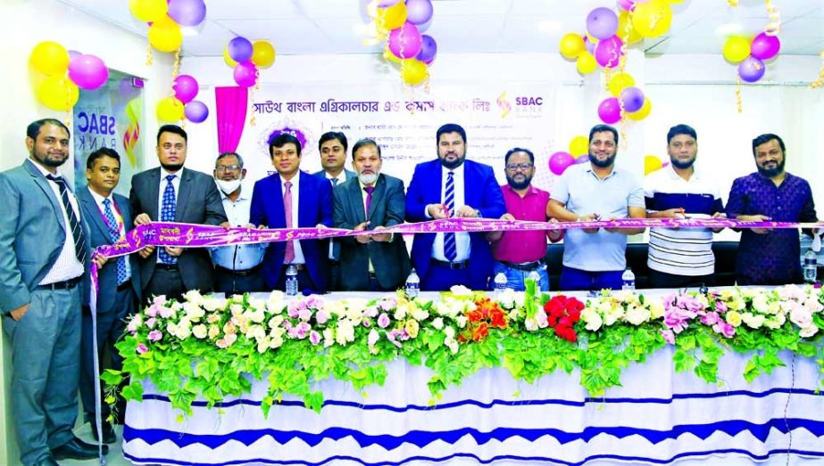 Md Mosharraf Hossain Prodhan Manik, Mayor of Madhabdi Municipality, inaugurating a sub-branch of South Bangla Agriculture & Commerce (SBAC) Bank Limited at Madhabdi in Narsingdi on Monday as chief guest. Senior officials of the bank and local businessman