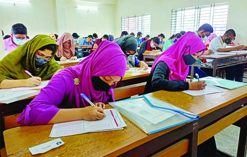 Students appear at the 'A' unit cluster entrance exam at Cumilla University on Sunday.