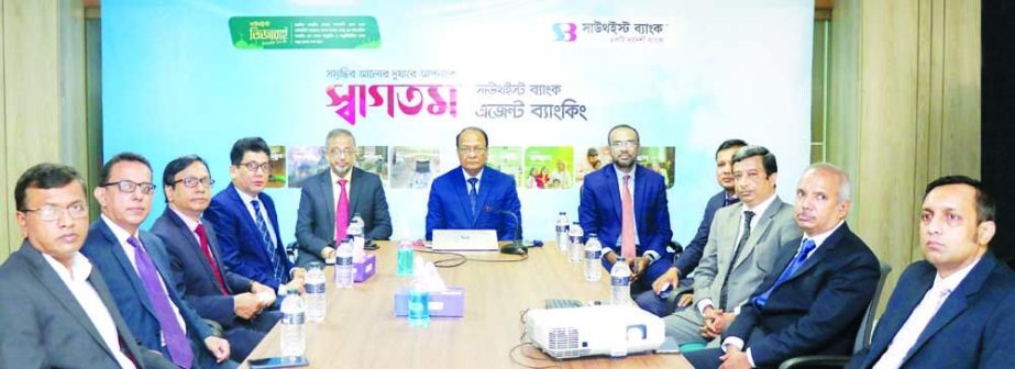M. Kamal Hossain, Managing Director of Southeast Bank Limited, poses for photo after inaugurating the banks 5 Agent Banking outlets through virtually recently. Other officials of the bank and Proprietors of the 5 Agent outlets were also present.