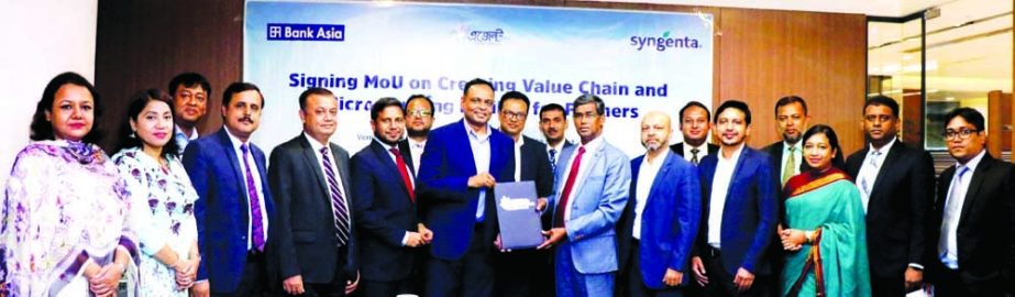 Md Arfan Ali, President & Managing Director of Bank Asia Limited and A M M Golam Towhid, Managing Director of Syngenta (BD), exchanging document after signing an agreement at Bank Asia Tower in the capital recently. Under the deal, target has been set to