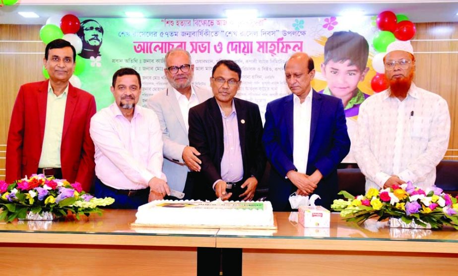 Kazi Sanaul Hoq, Chairman along with Md. Obayed Ullah Al Masud, Managing Director of Rupali Bank Limited, celebrating the 58th birthday of Sheikh Russel, by cutting a cake at the banks head office in the capital on Monday. All directors and senior executi