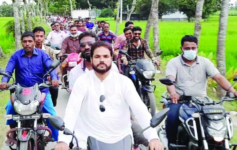 A huge motorcycle procession was taken out in support of Md. Bazlur Rashid, a potential candidate for the post of chairman of Uttargram Union Parishad in Mahadevpur upazila of Naogaon on Tuesday. NN photo