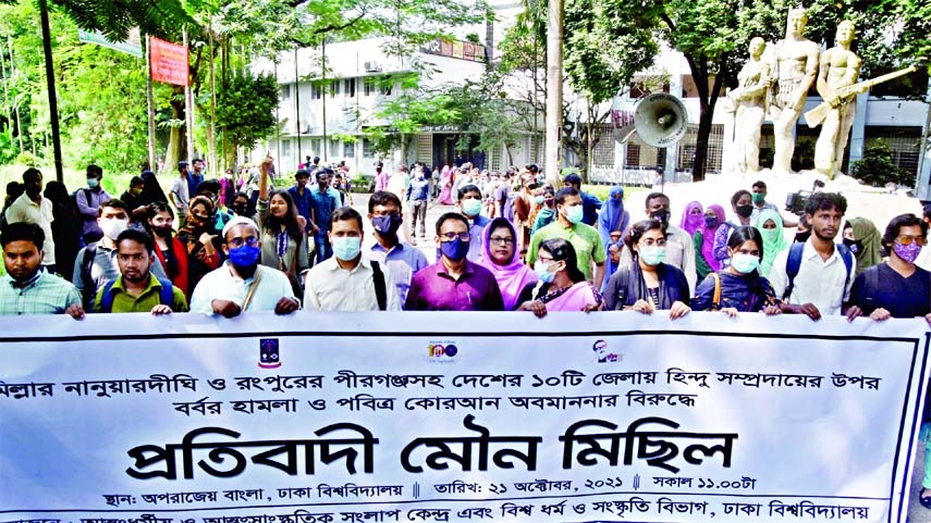 Inter-cultural Dialogue Centre brings out a procession on Thursday at Dhaka University Campus protesting recent assults on Hindu community in different parts of the country.