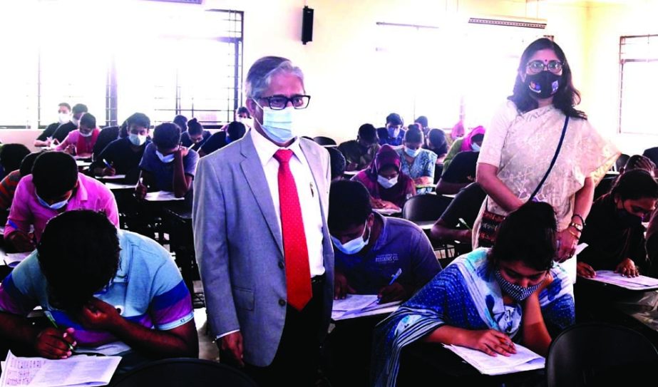 Vice -Chancellor of Dhaka University Prof Dr. Akhtaruzzaman, , among others, visits an examination center of admission test of the 'D' unit under the Social Science Faculty of DU for the 2020-21 academic session on Saturday. NN photo