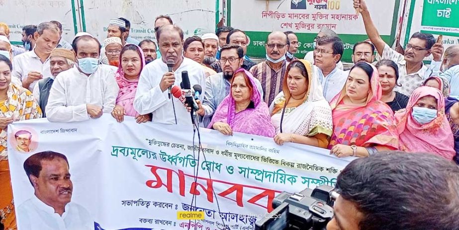Nationalist Democratic Front forms a human chain in front of the Jatiya Press Club on Saturday to realize its various demands including protection of communal harmony. NN photo