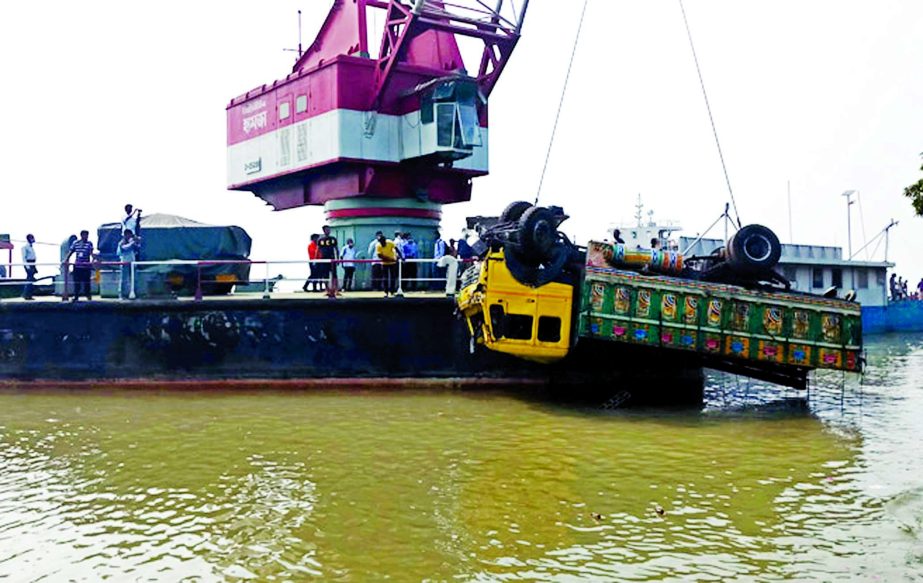 A Ro-Ro ferry with 17 loaded trucks and coverd vans sinks at Paturia dock in Manikganj on Wednesday. NN photo