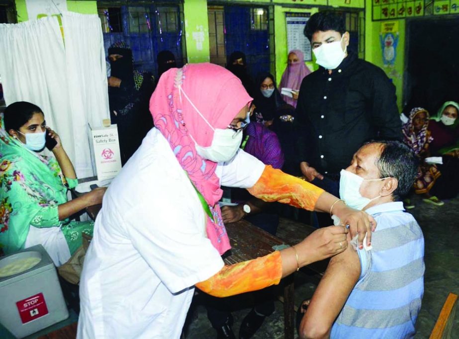 People being vaccinated in the city's Lalbag area on Thursday as part of the second dose of Covid-19 mass vaccination marking birthday of Prime Minister Sheikh Hasina. NN photo