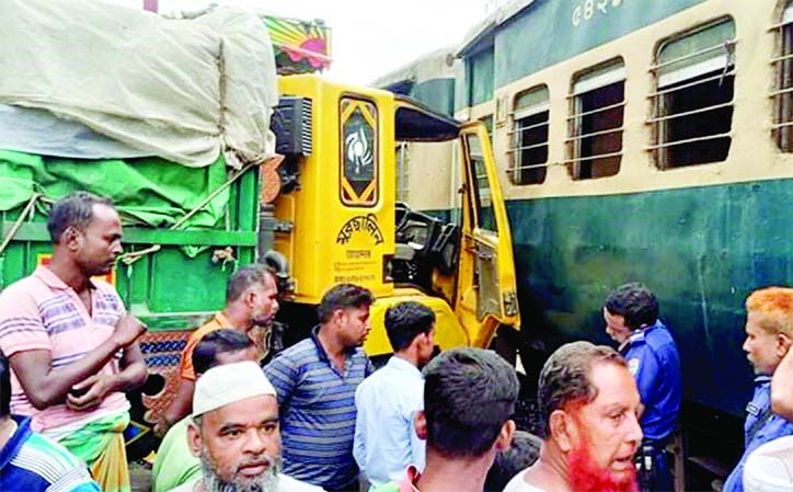 Inter-city passenger train ‘Dhalarchar Express’ collided with a truck at a level crossing resulting in a traffic jam for four hours on Ishawardi-Pabna highway on Thursday.