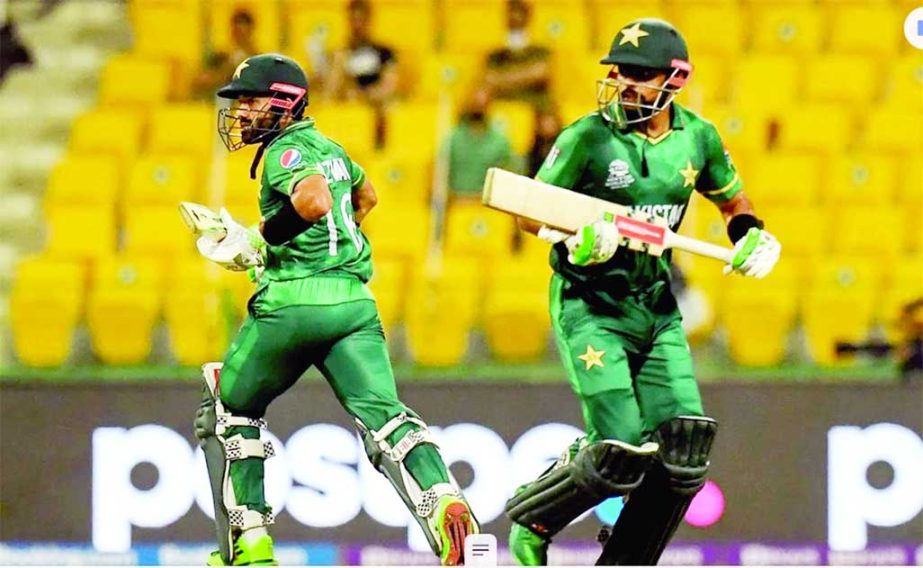 Babar Azam (left) and Mahammad Rizwan of Pakistan running between wickets against Namibia in their Group-2 match of the ICC T20 World Cup at Sheikh Zayed Cricket Stadium in the United Arab Emirates on Tuesday. NN photo