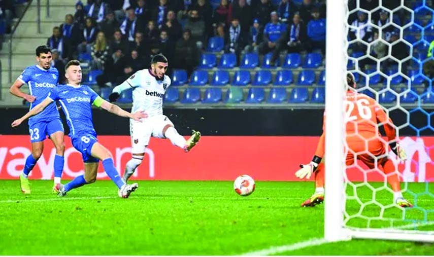 Said Benrahma (third from left) scores to put West Ham ahead against Genk in the sides' eventual draw in the Europa League on Thursday.