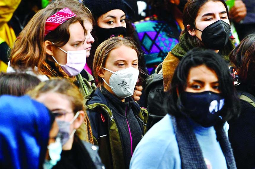 Swedish climate activist Greta Thunberg (C) joins a march by youth activists to protest against climate inaction on the sidelines of the COP26 UN Climate Summit in Glasgow Scotland, Britain, November 5.