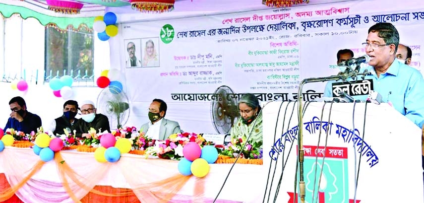 Agriculture Minister Dr Md Abdur Razzaque speaks as the chief guest at a function at Sher-e-Bangla Girls College in the capital on Sunday marking the birthday of Sheikh Russel. Education Minister Dr Dipu Moni was present on this occasion.