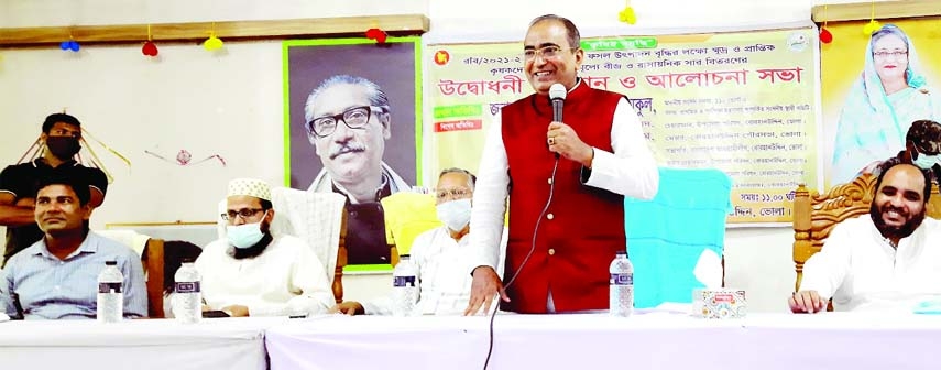 Ali Azam Mukul, MP as chief guest speaks at a free fertilizer and seed distribution program held in Borhanuddin, Bhola on Monday. Among 3,650 small and marginal farmers were distributed agriculture products for the Rabi season on the occasion.