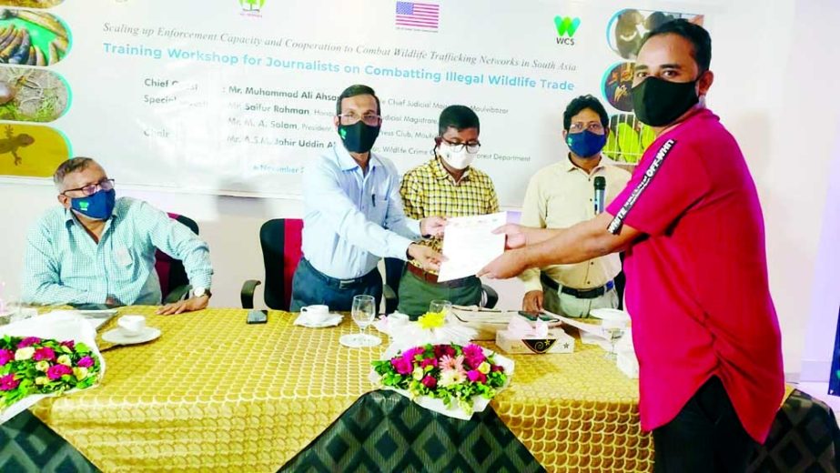 A view of certificate distribution at a programme in Moulvibazar. NN photo