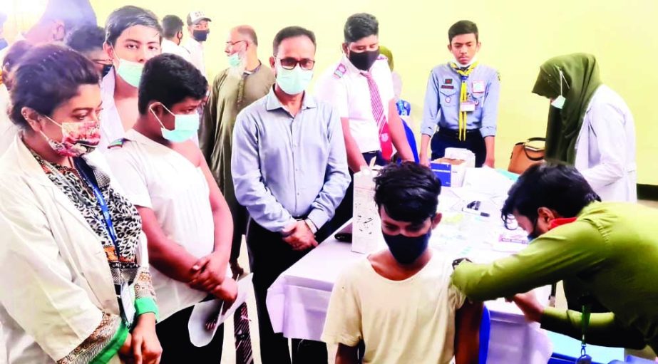 Students of the city's Ahmed Bawani School and College being vaccinated as per the Covid-19 vaccination programme of 12-17 years students. The snap was taken on Thursday. NN photo