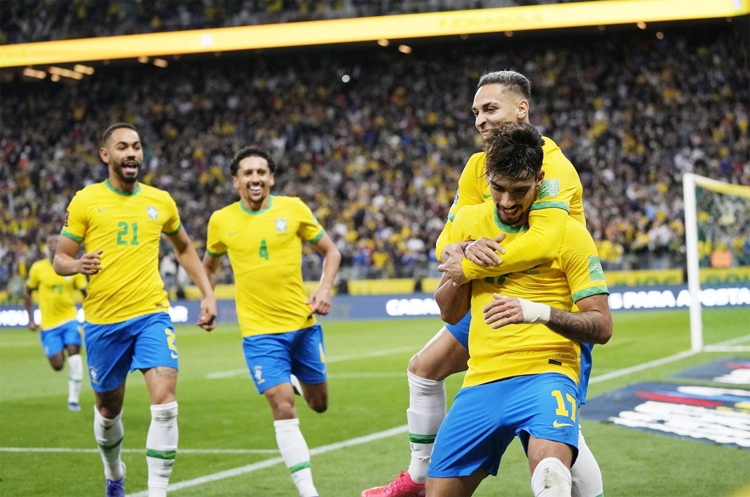 Brazil's Lucas Paqueta (right) celebrates with teammates after scoring against Colombia during a Qatar 2022 World Cup qualifier in Sao Paulo, Brazil on Thursday.