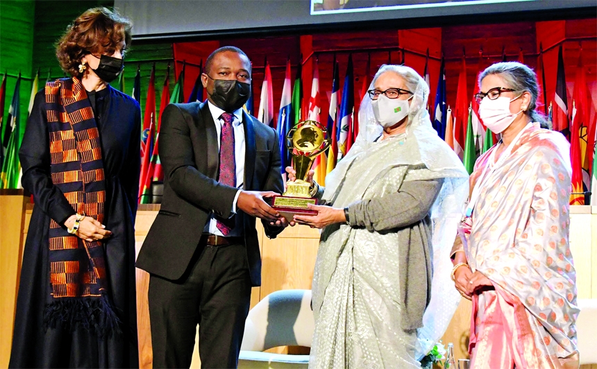 Prime Minister Sheikh Hasina hands over UNESCO-Bangladesh Bangabandhu Sheikh Mujibur Rahman International Prize for the "Creative Economy"" to MoTIV Creations Limited (Uganda) at UNESCO Headquarters in Paris on Thursday."